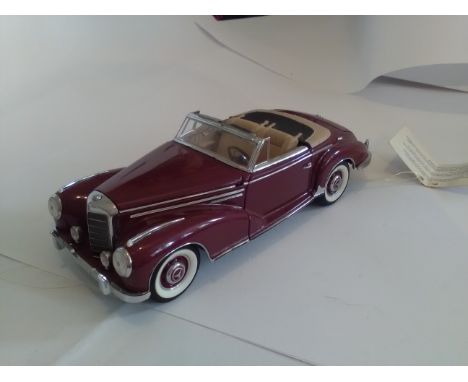 Mercedes Franklin mint 1/24 scale model of a Red 1957 Mercedes Benz 300SC in excellent condition. No box. Highly detailed qua