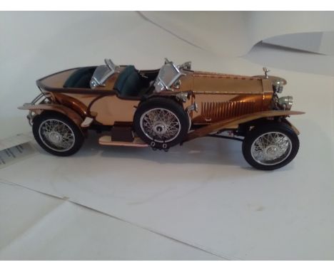 Rolls Royce Franklin mint 1/24 scale model of a 1921 Rolls Royce Silver Ghost with original high quality copper body. No box.