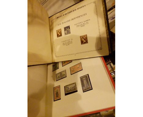 STAMP ALBUMS. Album of Commonwealth George VI postage stamps and album of Commonwealth Elizabeth II postage stamps