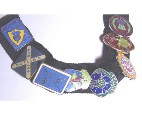 BUTLINS BADGES. Eight original enamel Butlins badges 