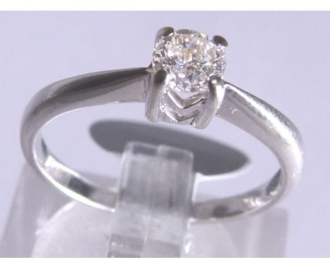 9CT SOLITAIRE RING. 9ct white gold 0,25ct diamond solitaire ring, size K