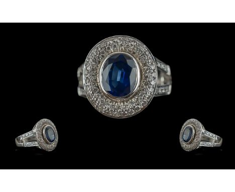 Ladies 18ct White Gold Sapphire and Diamond Set Cluster Ring, marked 750 to interior of shank, the blue faceted sapphires of 