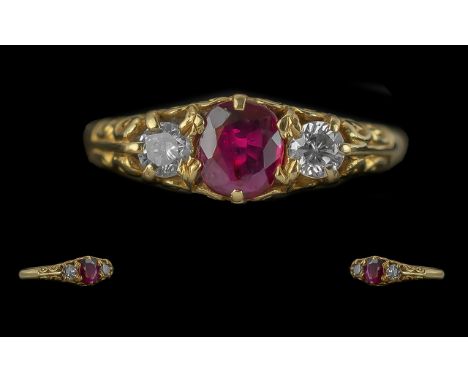 Ladies - Pleasing Quality 18ct Gold 3 Stone Ruby and Diamond Set Ring. Full Hallmark to Interior of Shank. The Ruby Flanked b