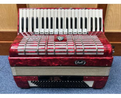 Bell Piano Accordion, in fully fitted box, case in red marble effect. 