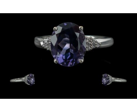 Ladies 9ct White Gold Diamond and Amethyst Set Dress Ring, full hallmark to interior of shank, the large, faceted amethyst of