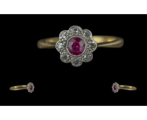 Edwardian Period 1902 - 1910 18ct Gold Pleasing and Petite Diamond and Ruby Set Ring. Marked 18ct Gold and Platinum. The Cent