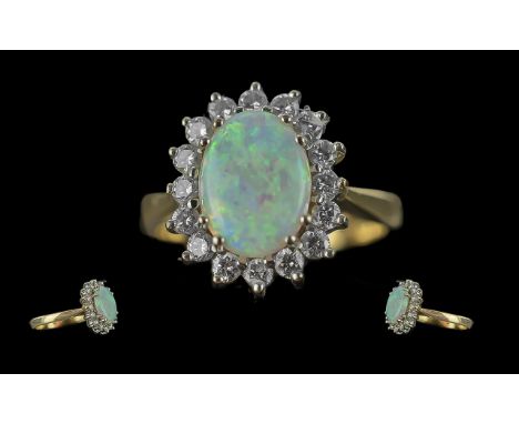 Ladies 18ct Gold Opal and Diamond Set Ring, Flower head Design. Full Hallmark to Interior of Shank. The Central Opal of Pleas