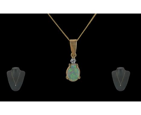 Ladies - Attractive 9ct Gold Diamond and Opal Set Pendant with Attached 9ct Gold Chain. Marked 9ct. Opal an Diamond of Pleasi