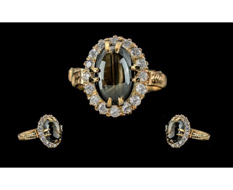 Ladies 18ct Gold Pleasing Quality Diamond and Black Gem Stone Set Ring. The Polished Cabouchon Cut Black Gem Stone of Pleasin