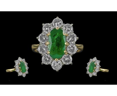 Ladies Excellent Quality Stunning 18ct Gold Emerald and Diamond Set Ring. Full Hallmark to Interior of Shank. The Oval Shaped