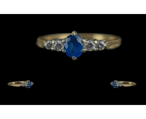 Ladies Attractive 9ct Gold 3 Stone Diamond and Sapphire Set Ring. The Central Sapphire of Excellent Colour, Flanked by Two Fa