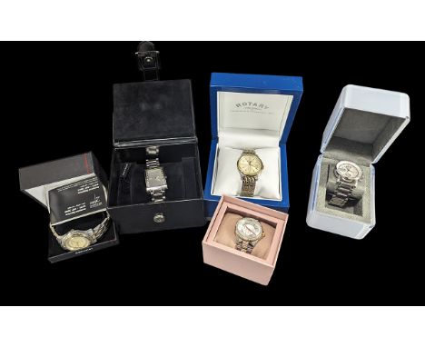 Collection of Quality Wristwatches, comprising  a gentleman's DKNY chrome bracelet watch with baton numerals and apertures, i
