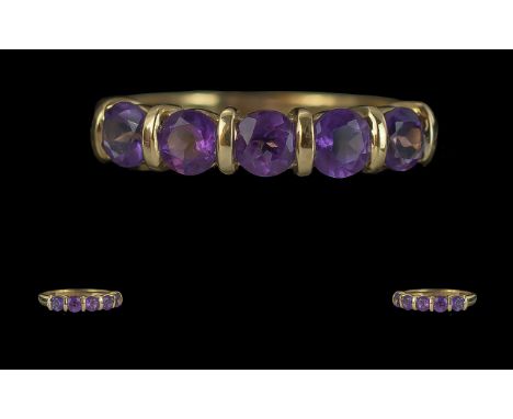 Ladies - Attractive 9ct Gold 5 Stone Amethyst Set Ring. Full Hallmark to Shank. The Well Matched Amethyst of Good Colour / Cl