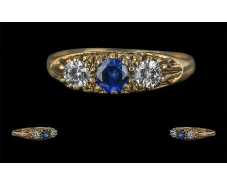 Ladies - Attractive 9ct Gold 3 Stone Sapphire and CZ Ring. Full Hallmark to Shank. The Central Faceted Blue Sapphire of Good 