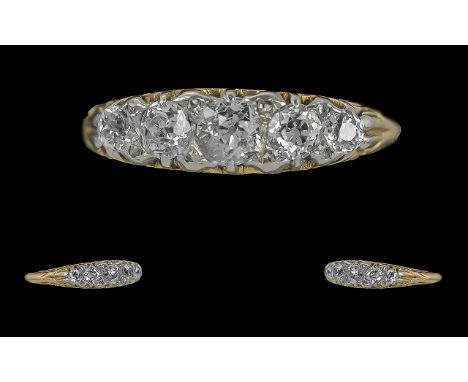 Antique Period Ladies 18ct Gold Five Stone Diamond Set Ring, the five faceted diamonds, in a gallery setting, of good colour 