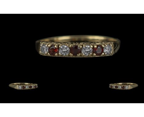 Ladies - Attractive 9ct Gold Ruby and Diamond Set Ring. Full Hallmark to Interior of Shank. Rubies and Diamonds of Pleasing C