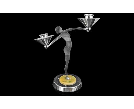 Art Deco Style Lady Chrome Candle Stick, in the form of a lady holding aloft two candle holders.  Raised on a circular base o