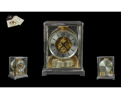 Jaeger-Le-Coultre Atmos Vlll Classic Mantel Clock, model no. 5852, runs on perpetual motion, the winding mechanism is powered