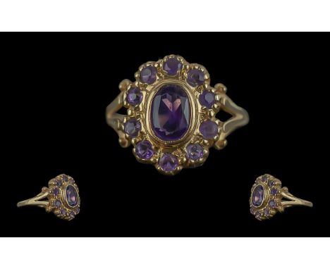 Antique Period Pleasing and Petite 9ct Gold Amethyst Set Dress Ring, full hallmark to interior of shank; the central amethyst