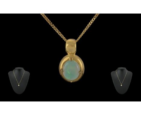 Ladies Attractive 18ct Gold Opal Set Pendant Attached to a 18ct Gold Chain. Marked 750 - 18ct. The Oval Shaped Opals of Good 