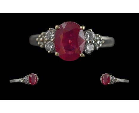 Ladies - Attractive 14ct White Gold Ruby and Diamond Set Ring. Marked 14ct to Interior of Shank. The Faceted Ruby of Pleasing