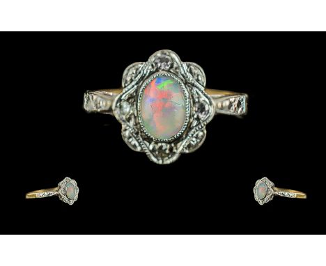 Antique Period Attractive and Petite 18ct Gold Opal and Diamond Set Ring of pleasing design, marked to interior of shank, the