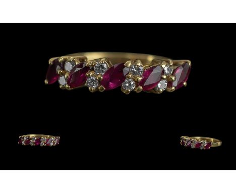 Ladies Attractive 18ct Gold Ruby and Diamond Set Dress Ring, full hallmark to interior of shank, the faceted diamonds and rub