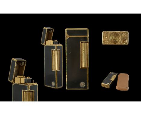 Vintage Dunhill Lighter in leather case, black and gold colourway.