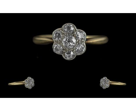 Ladies Excellent Quality 18ct Gold Diamond Set Dress Ring of flower head design, marked 18ct and platinum to interior of shan