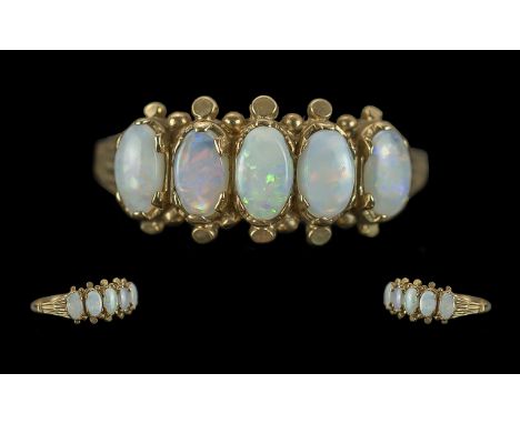 Antique Period Ladies Attractive 9ct Gold 5 Stone Opal Set Ring of Pleasing Setting. Full Hallmark to Interior of Shank. The 