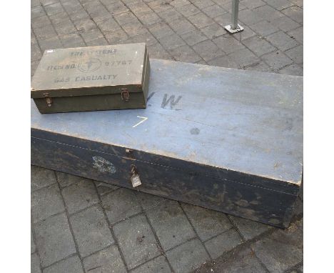 An early 20th century painted trunk, 120cm, together with an American World War II first aid box (2)