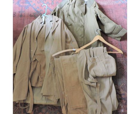 A World War II women's Land Army uniform, comprising heavy duty belted raincoat, two jackets and three pairs of dungarees (6)