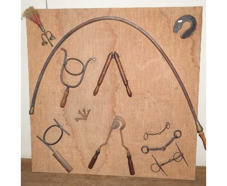 A 19th century wooden Rutter's horse twitch, together with two lyre horse gags, heavy horse related items, bits and tools