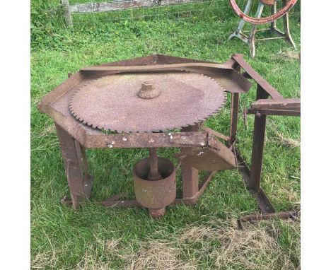 A tractor driven circular saw bench