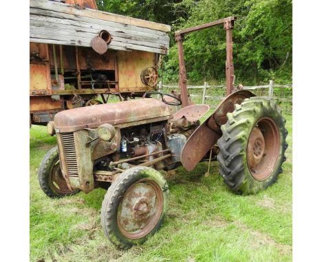 A grey Ferguson tractor, for restoration, no 408129. this one has been used on the farm since around 1976, with additional wh