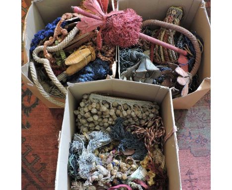 Three boxes of curtain tie backs and fringing