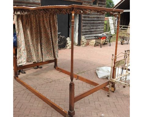 A 20th century four poster bedstead, with fabric valence, curtains and covers, 146cm. Provenance: Bonhams146w 209d x 195h cm