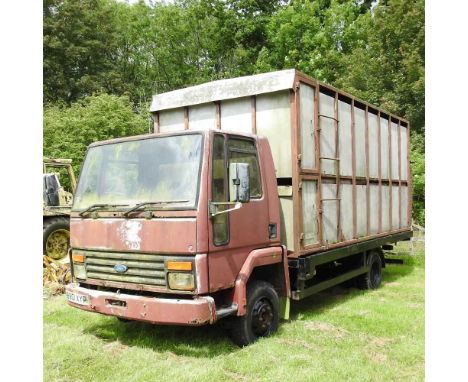 Plus VAT - A Ford Cargo livestock lorry, registration B801 XYP, for restoration. First registered 1985 and used on the farm a