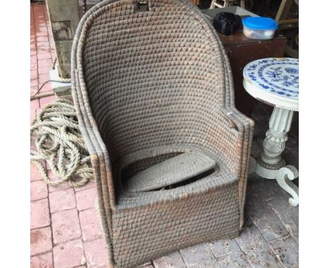 A 19th century woven commode chair, together with a wicker occasional table, another, wicker basket and an oak occasional tab