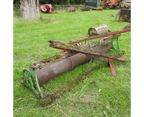 A flat heavy roller, with a wooden frame, W E Wigg, Barnby, nr Beccles