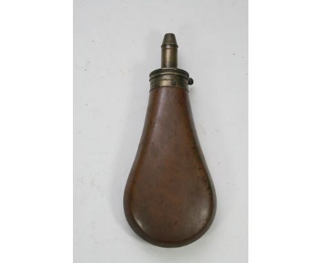 A copper powder flask.