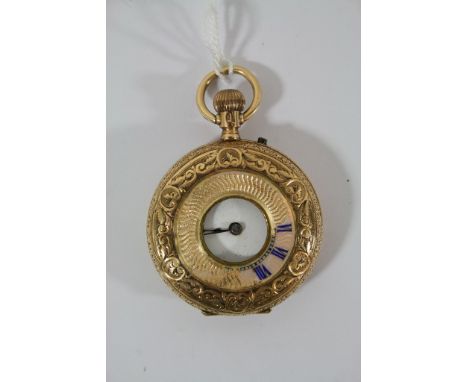 An 18K gold half hunter pocket watch.