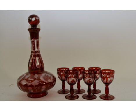 A Bohemian glass drinks set comprising decanter and six glasses.