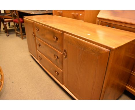 An Ercol lightwood sideboard