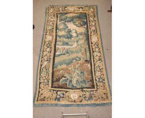 A late 17th or early 18th Abusson tapestry with restoration label attached.
