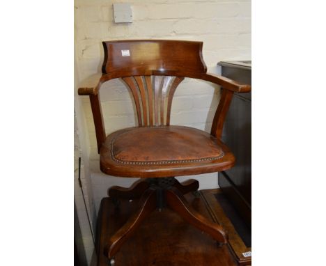 A collection of five antique chairs including a stick back chair, a swivel chair and three with shaped backs.