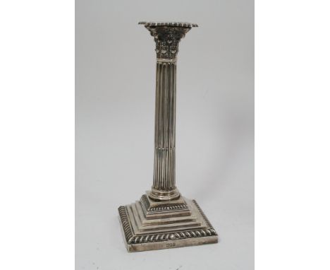 A silver Corinthian column candlestick, London 1899.