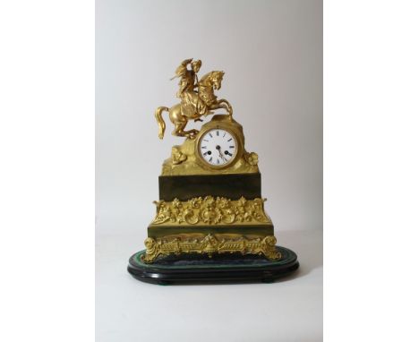 A French 19th Century gilt mantle clock with silk suspension movement 