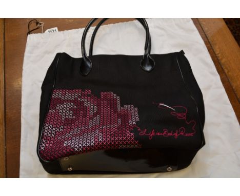 A large limited edition Lulu Guinness designer handbag, black embroidered canvas 'Life is a bed of Roses', with dustbag
