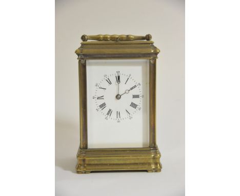 An oxidised brass carriage clock with strike repeat